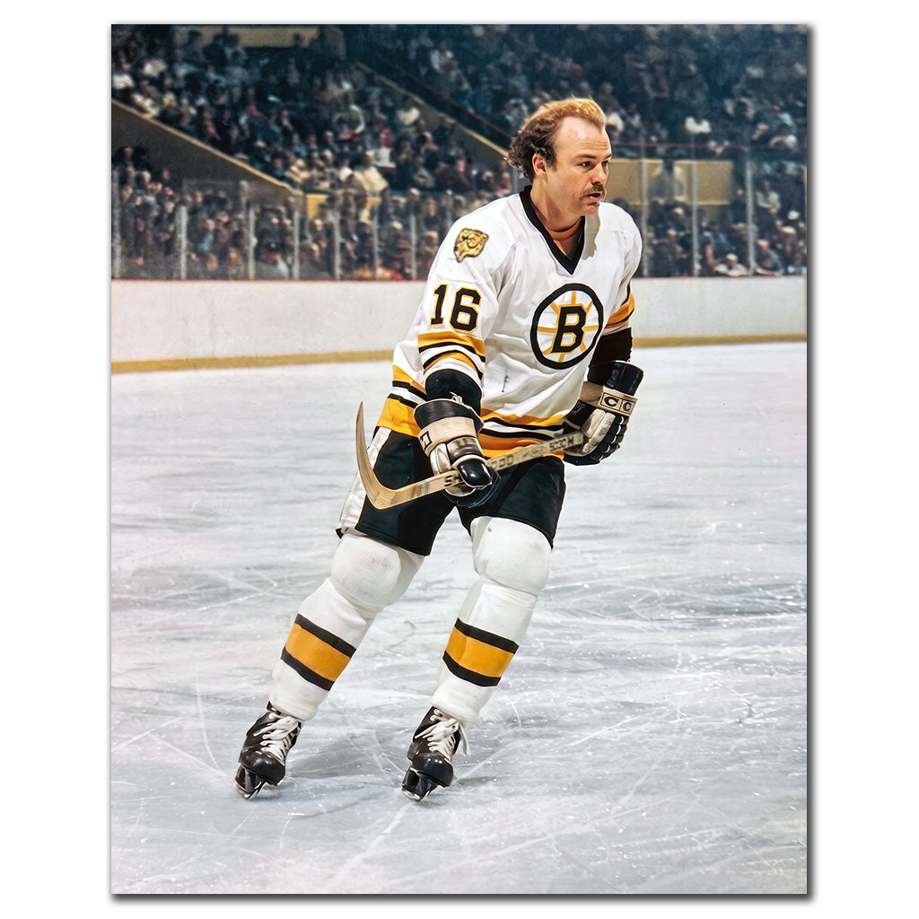 Rick Middleton on the ice in a white Boston Bruins uniform