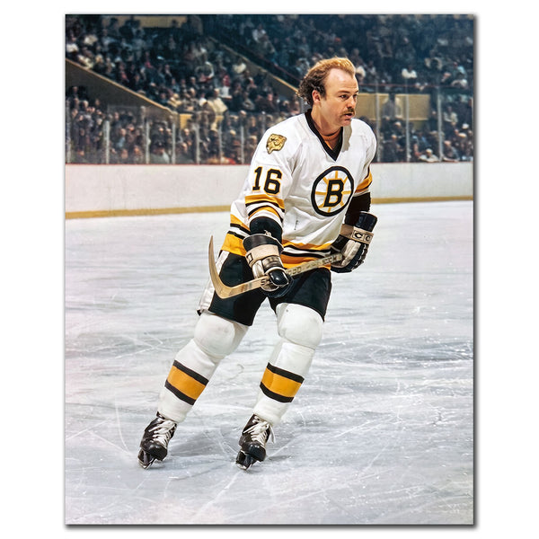Rick Middleton on the ice in a white Boston Bruins uniform