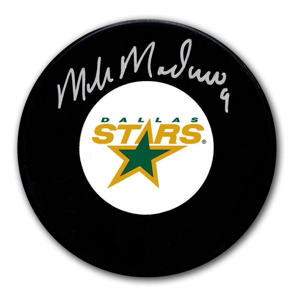 Mike Modano autographed Dallas Stars hockey puck with silver signature