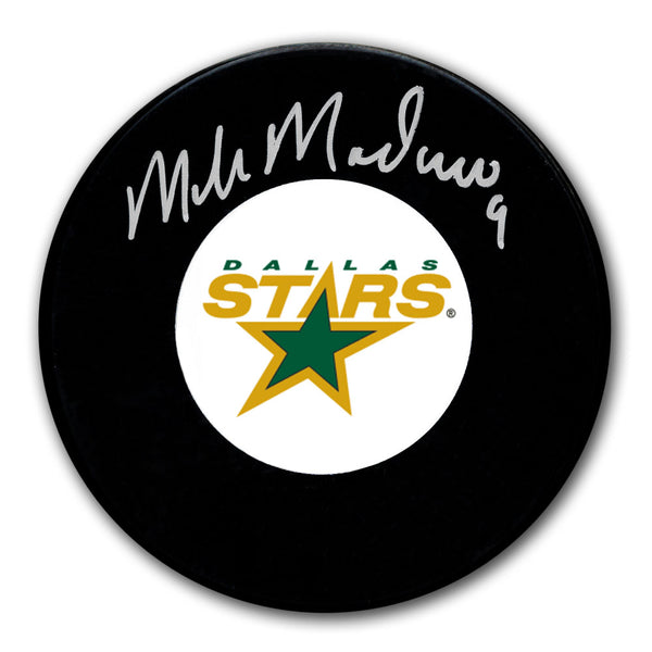 Mike Modano autographed Dallas Stars hockey puck with silver signature