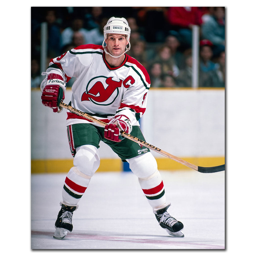 Kirk Muller skating in a white New Jersey Devils uniform