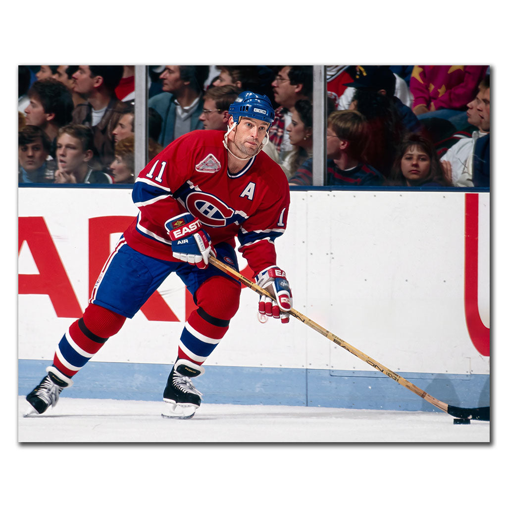 Kirk Muller skating with the puck in a red Montreal Canadiens uniform