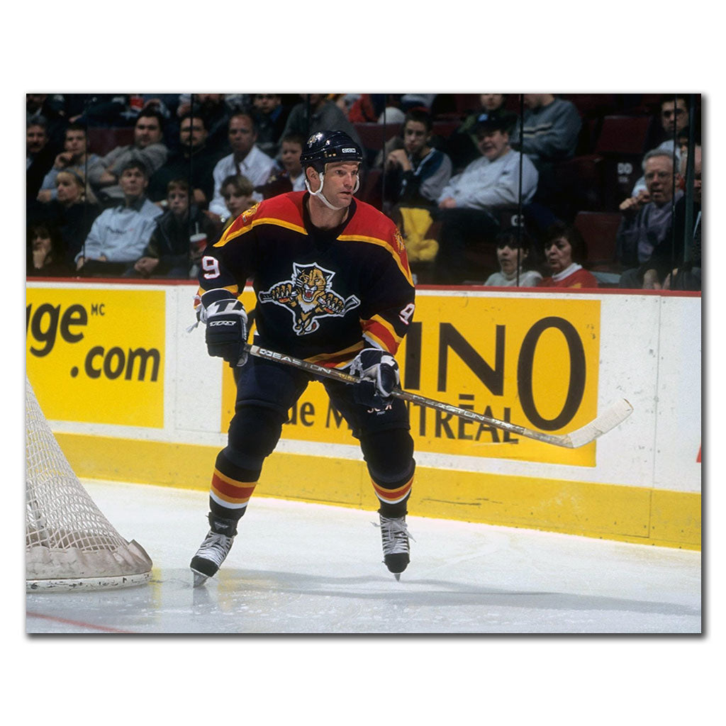 Kirk Muller skating in a black Florida Panthers uniform