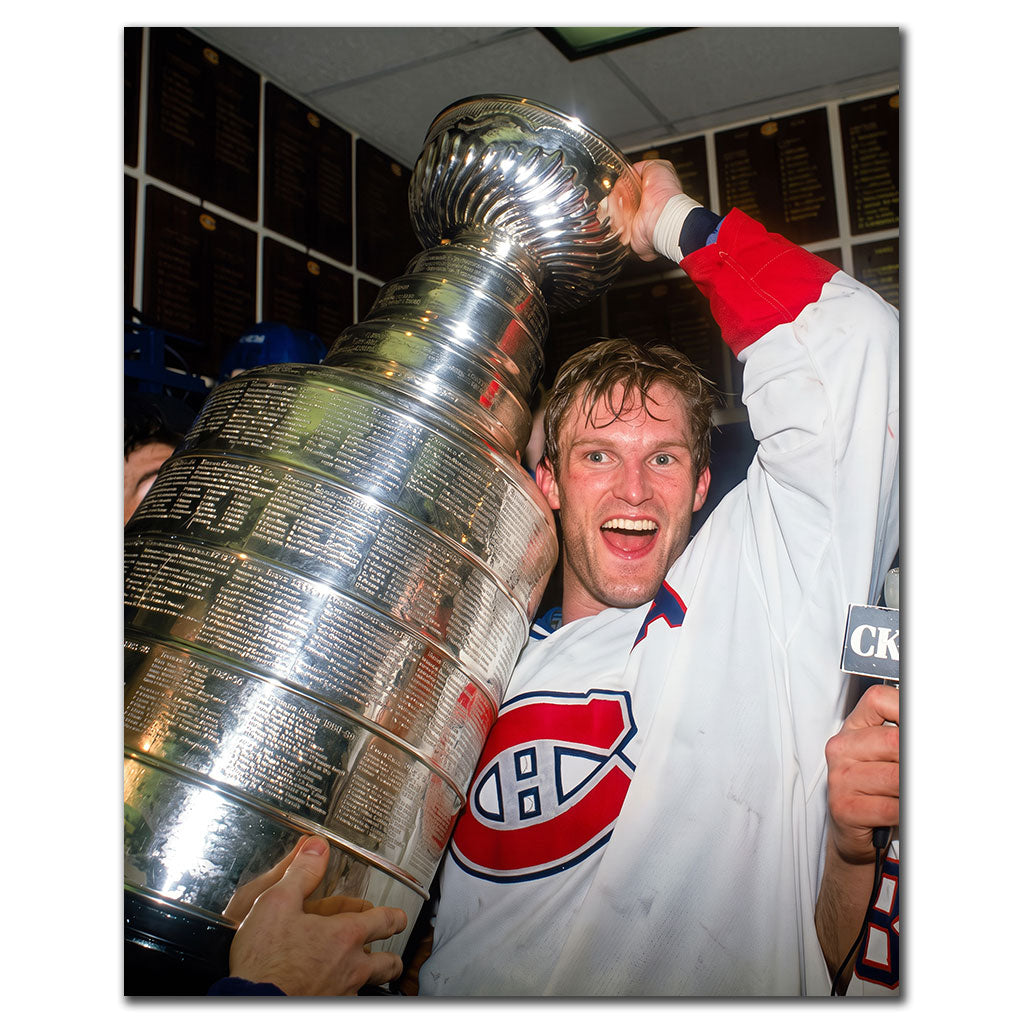 Kirk Muller celebrating with the Stanley Cup in a Montreal Canadiens uniform