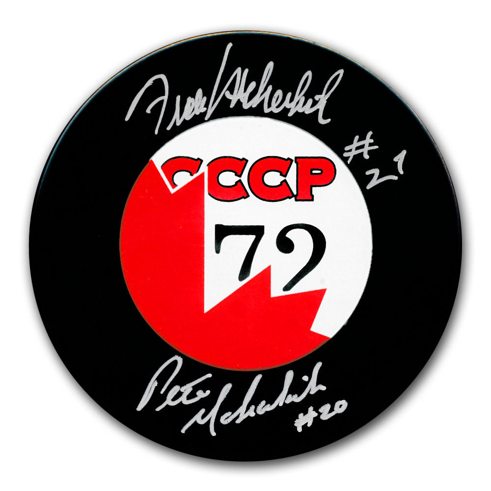 Frank Mahovlich and Pete Mahovlich autographed Team Canada 1972 Summit Series hockey puck