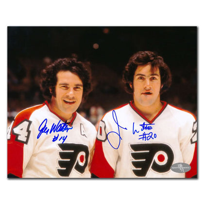 An 8x10 inscribed photo of smiling Flyers players Jim & Joe Watson, both signatures visible—authentic dual autographed memorabilia.