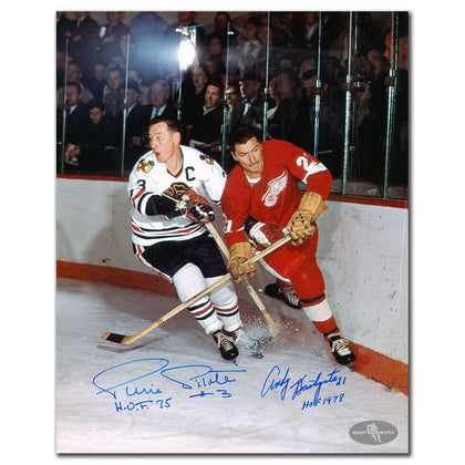Dual autographed 8x10 Hall of Fame photo featuring Pierre Pilote and Andy Bathgate battling for the puck, signed in bold ink.