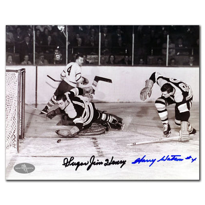 Signed 8x10 photo of Sugar Jim Henry and Harry Watson, Bruins vs Maple Leafs action with visible fan crowd in the background.