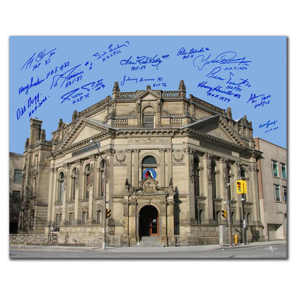 16x20 signed photo of Hockey Hall of Fame Building with ornate columns, bearing 14 blue autographs across the image.