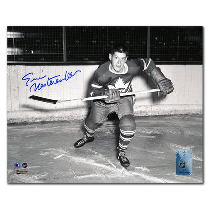 Eric Nesterenko autographed 8x10 action photo in Toronto Maple Leafs uniform, certified authentic sports memorabilia.