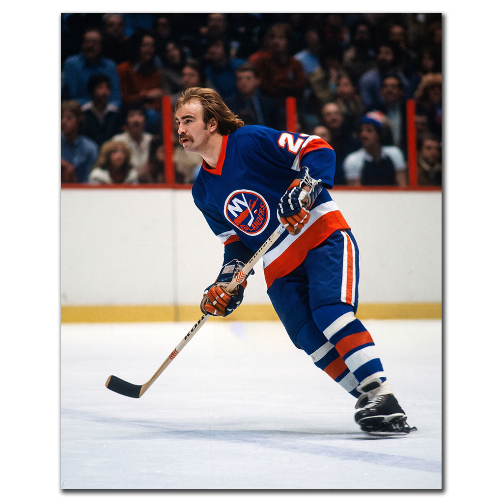 Bob Nystrom skating in a New York Islanders uniform during a hockey game
