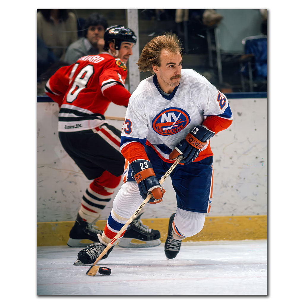Bob Nystrom skating in a white New York Islanders uniform during a hockey game