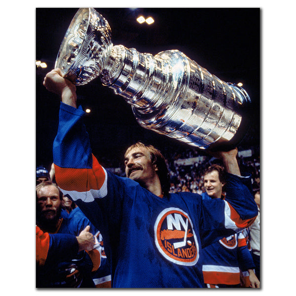 Bob Nystrom lifting the Stanley Cup in a New York Islanders uniform