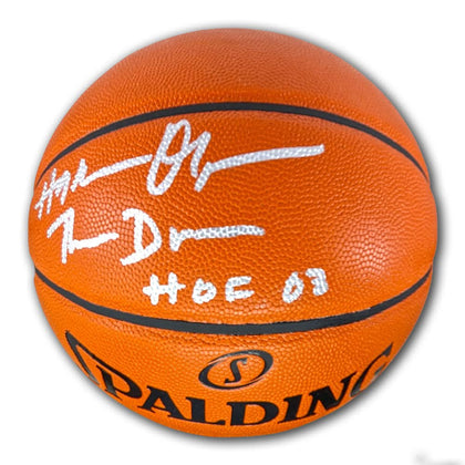 Hakeem Olajuwon The Dream HOF 09 signature on official Spalding NBA game basketball—ideal signed collectible.