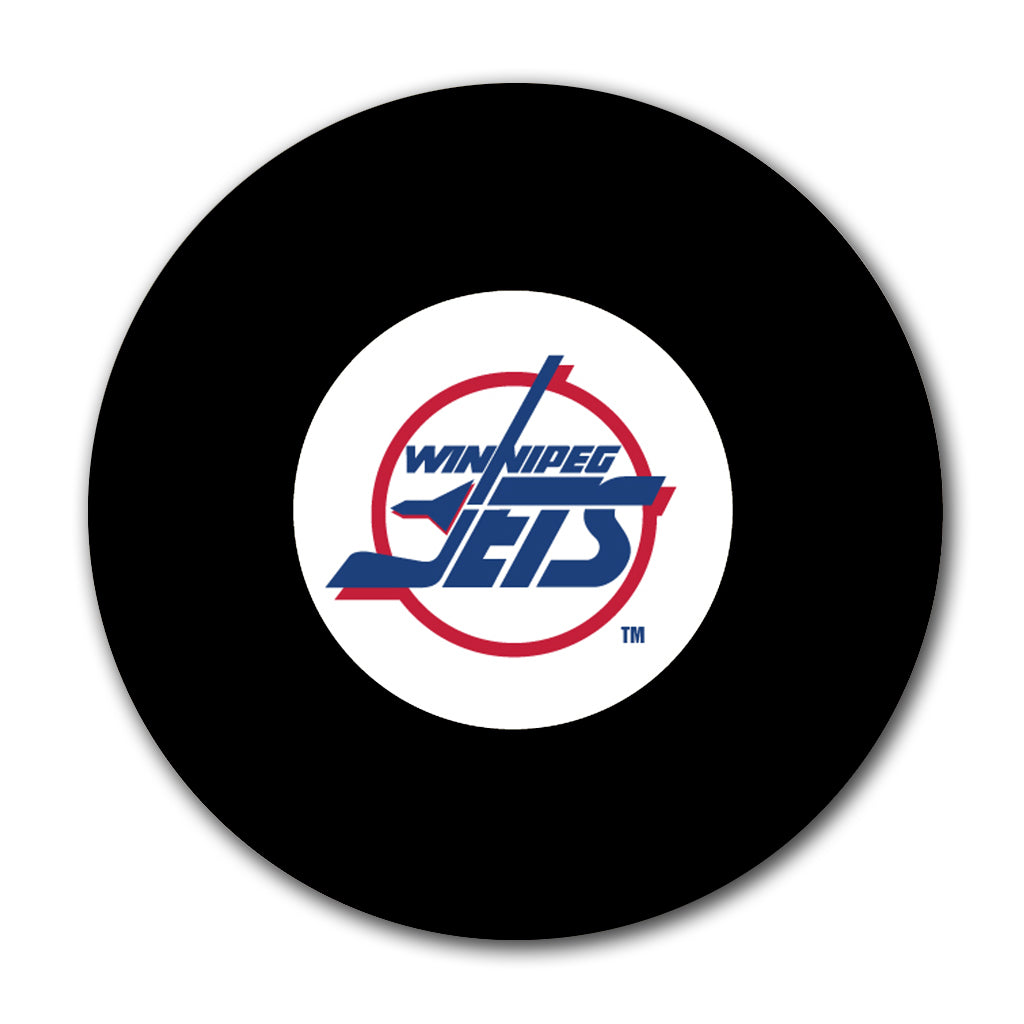 Black Winnipeg Jets hockey puck with the classic team logo centred on a white background