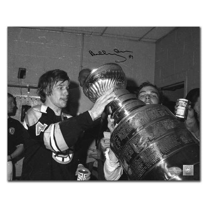 Autographed 16x20 photo of Bobby Orr celebrating the 1972 Stanley Cup win, featuring his signature and COA, Boston Bruins memorabilia.