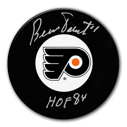 Autographed Philadelphia Flyers hockey puck signed by HOF goalie Bernie Parent, featuring the team logo—authentic memorabilia.