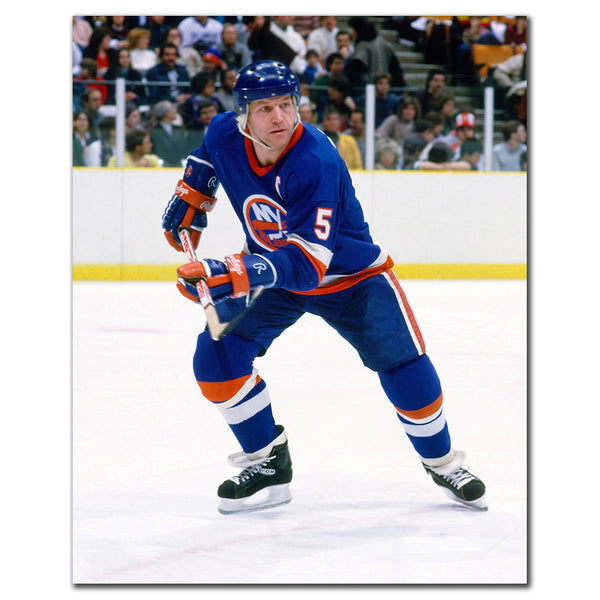 Denis Potvin New York Islanders 8x10 hockey photo in a blue uniform skating during an NHL game for autograph pre-order