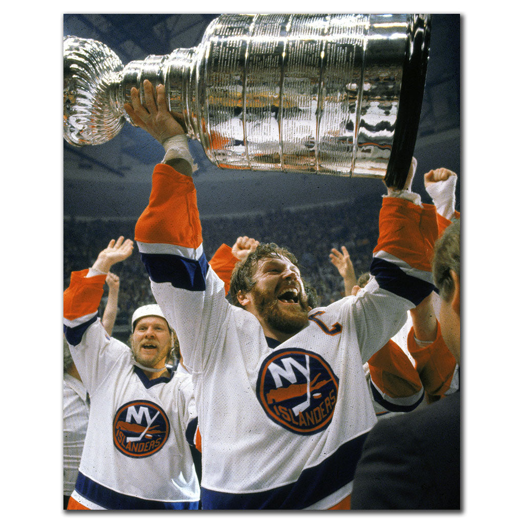 Denis Potvin New York Islanders 8x10 hockey photo in a white uniform celebrating while lifting the Stanley Cup for autograph pre-order