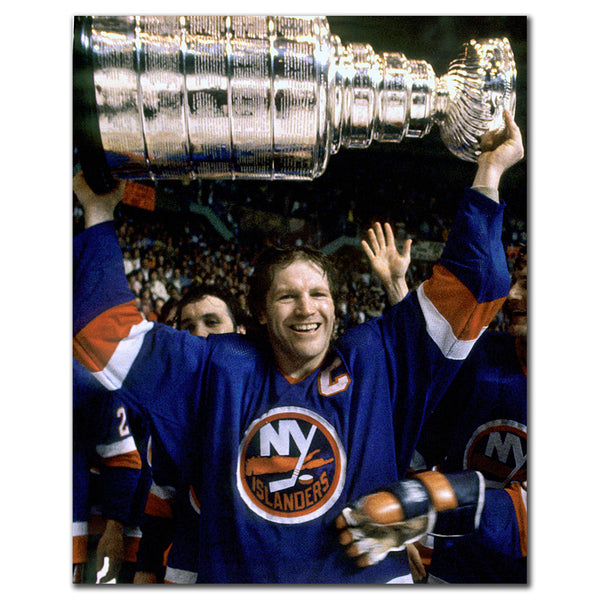 Denis Potvin New York Islanders 8x10 hockey photo in a blue uniform smiling while lifting the Stanley Cup for autograph pre-order