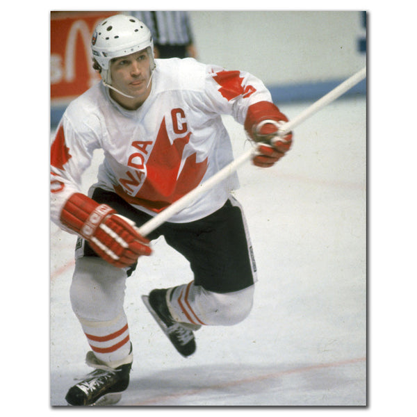 Denis Potvin Canada Cup 8x10 hockey photo in a white Canada uniform skating on the ice for autograph pre-order