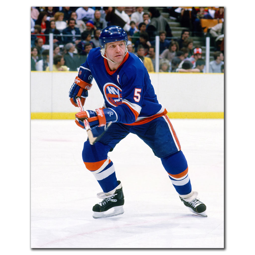 Denis Potvin New York Islanders 16x20 hockey photo in a blue uniform skating during an NHL game for autograph pre-order