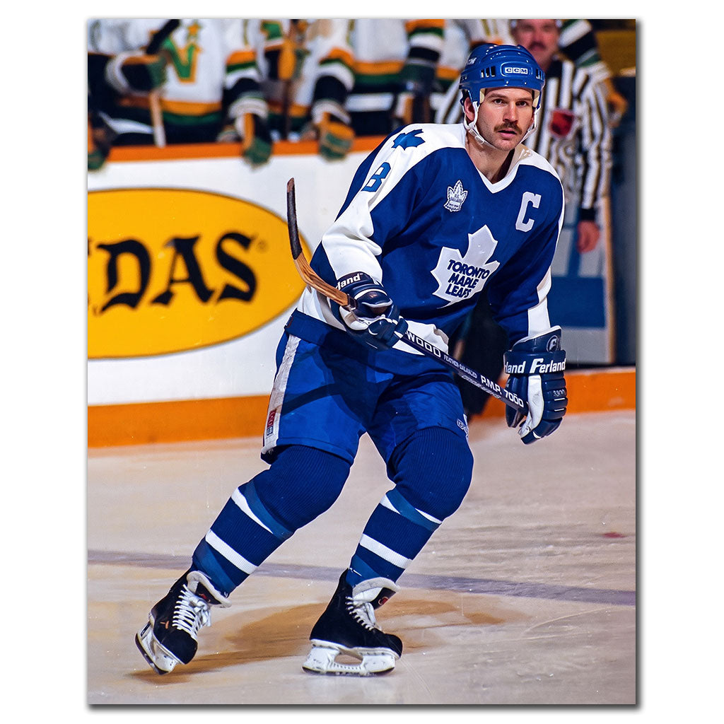 Rob Ramage skating in a blue Toronto Maple Leafs uniform