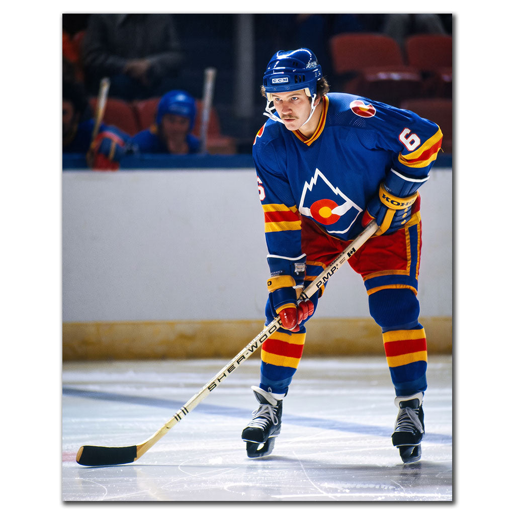 Rob Ramage on the ice in a blue Colorado Rockies uniform