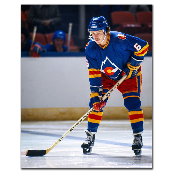 Rob Ramage on the ice in a blue Colorado Rockies uniform