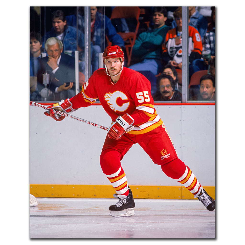 Rob Ramage skating in a red Calgary Flames uniform