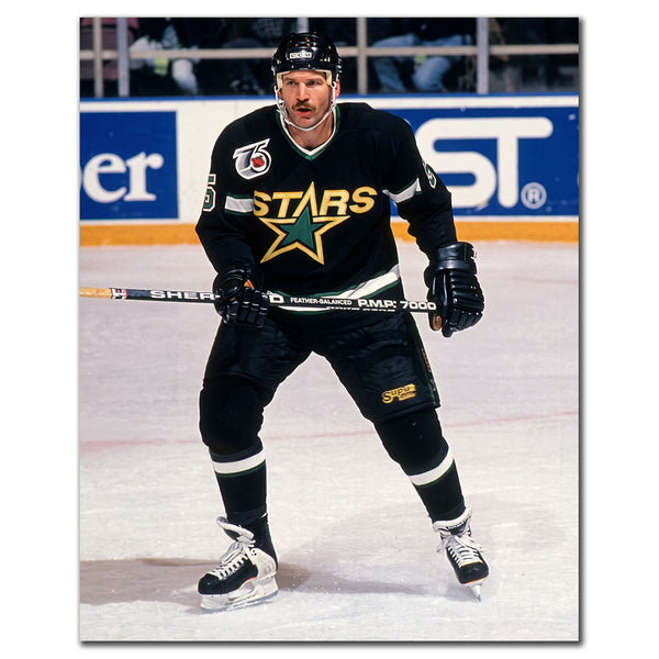 Rob Ramage on the ice in a black Minnesota North Stars uniform