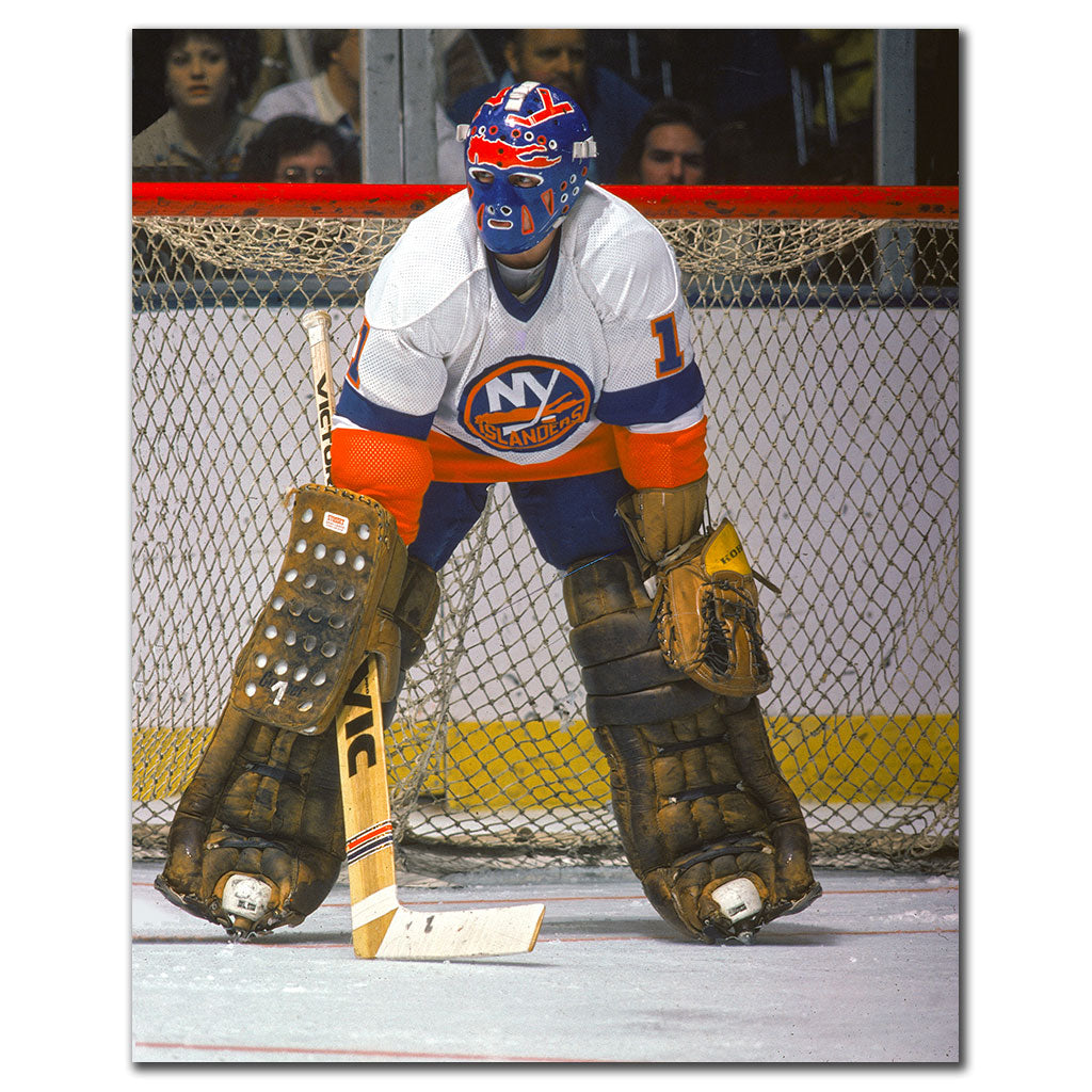 Chico Resch New York Islanders 8x10 hockey photo wearing a blue and orange goalie mask and white uniform in front of the net for autograph pre-order