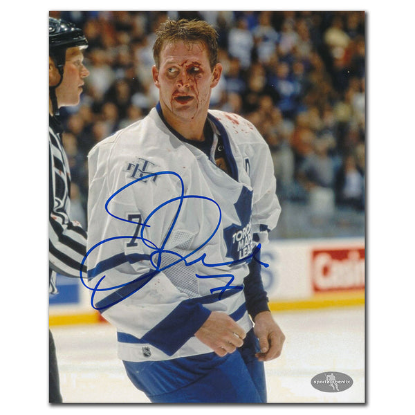 Gary Roberts autographed Toronto Maple Leafs 8x10 photo in white jersey during on-ice battle