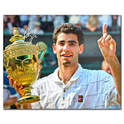 Pete Sampras celebrates with an autographed 16x20 inscribed photo from the 1995 Wimbledon Tennis Championship.