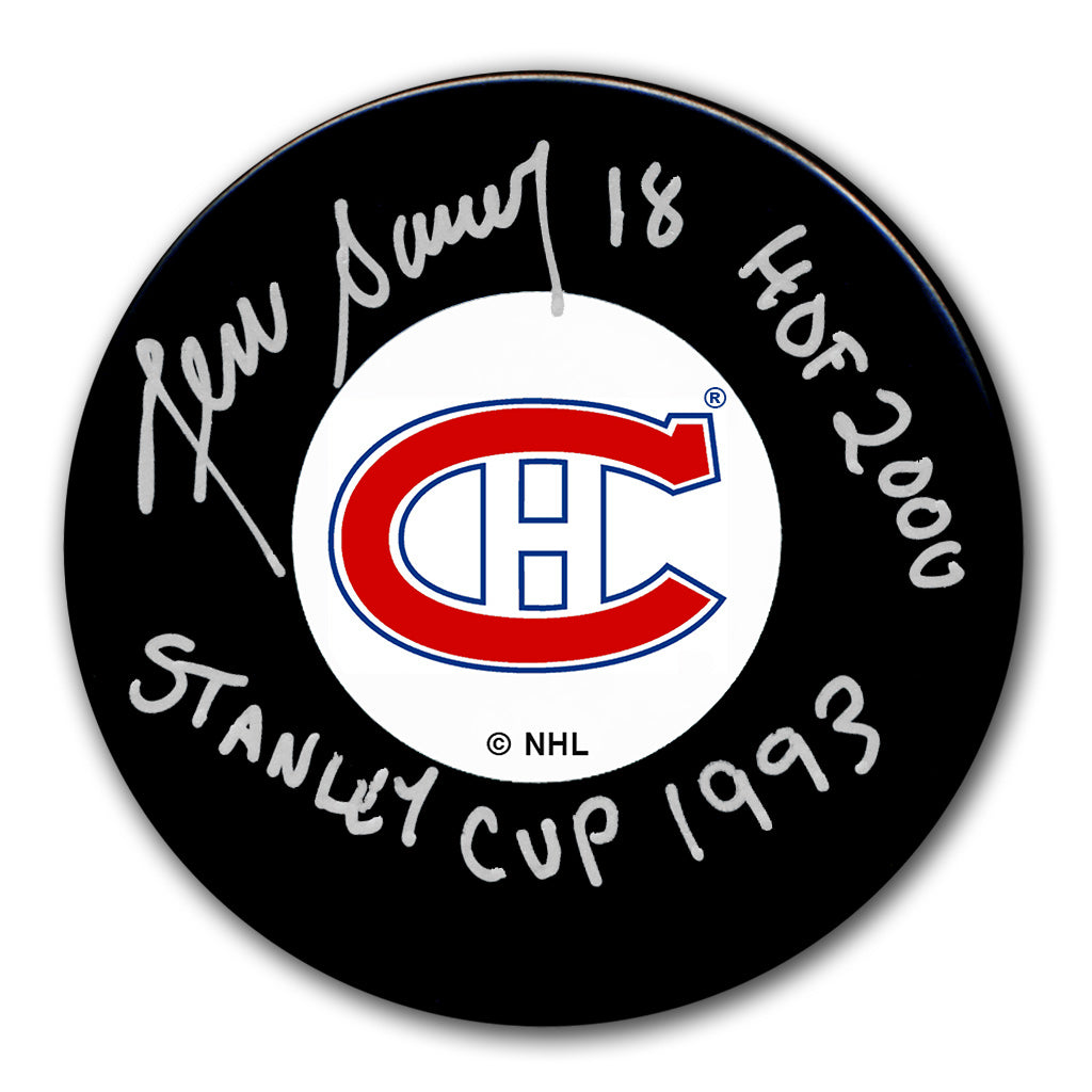 Denis Savard autographed Montreal Canadiens hockey puck with HOF 2000 and Stanley Cup 1993 inscriptions