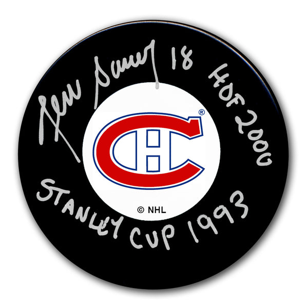 Denis Savard autographed Montreal Canadiens hockey puck with HOF 2000 and Stanley Cup 1993 inscriptions