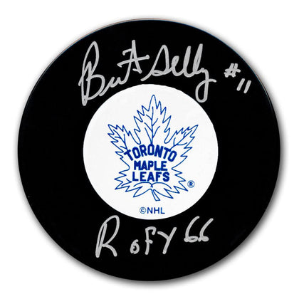 Brit Selby Toronto Maple Leafs 1966 ROY signed collector puck, featuring two silver autographs and #11 inscribed on the top.