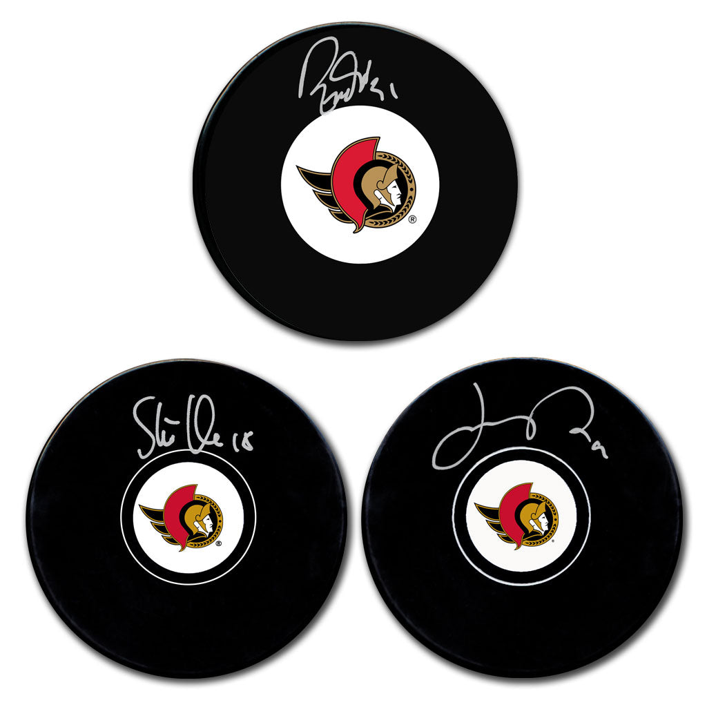 Tim Stutzle Josh Norris and Ron Tugnutt autographed Ottawa Senators hockey puck bundle