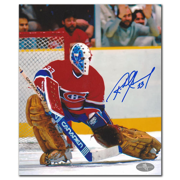 Richard Sevigny autographed Montreal Canadiens 8x10 hockey photo in red jersey during game action in front of the net