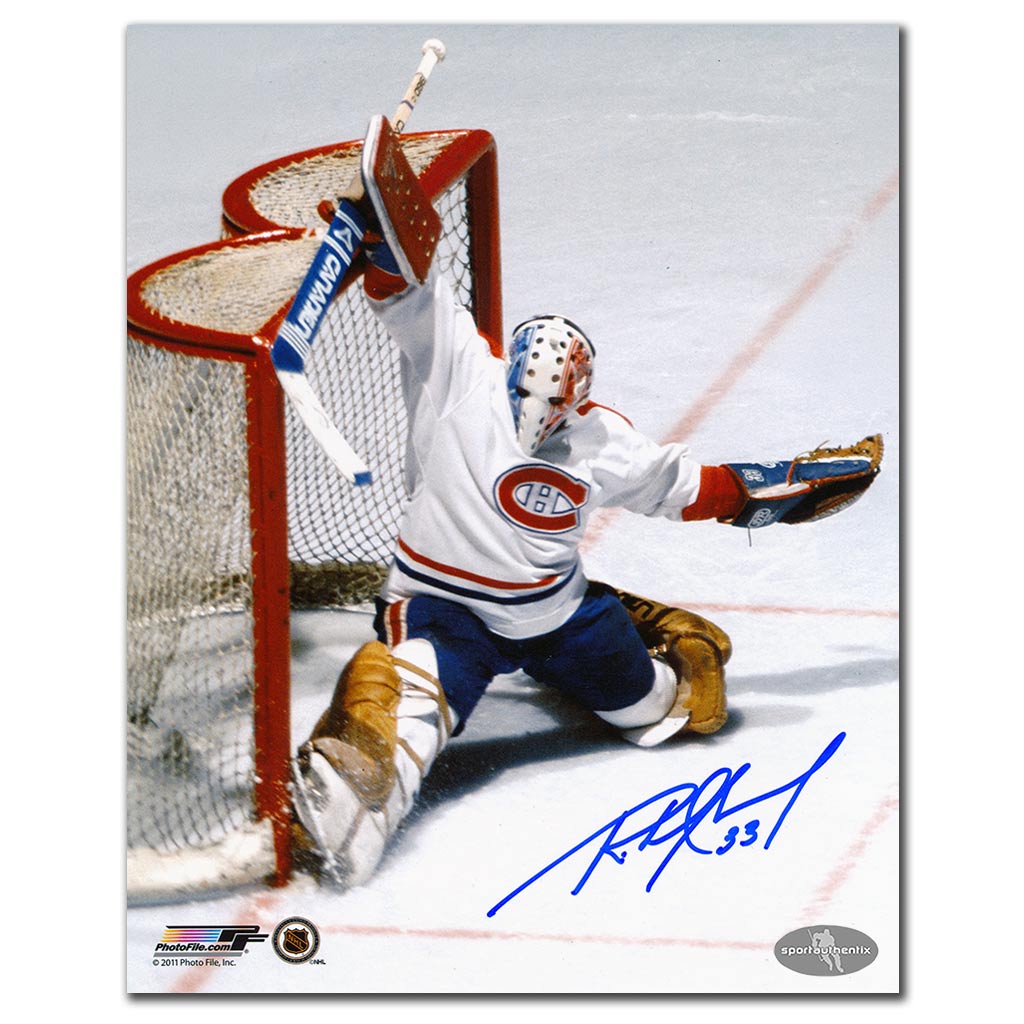Richard Sevigny autographed Montreal Canadiens 8x10 hockey photo in white jersey making a big save in front of the net