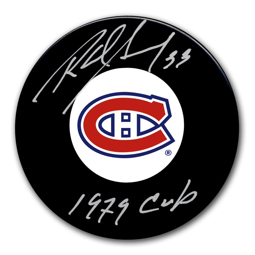 Richard Sevigny autographed Montreal Canadiens hockey puck with 1979 Cup inscription
