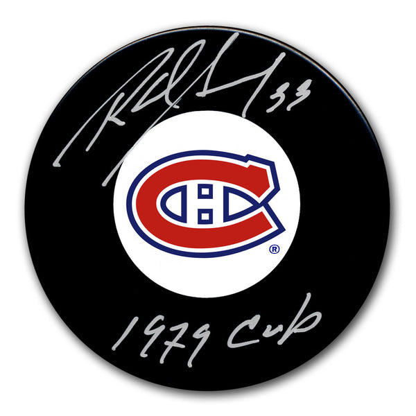 Richard Sevigny autographed Montreal Canadiens hockey puck with 1979 Cup inscription