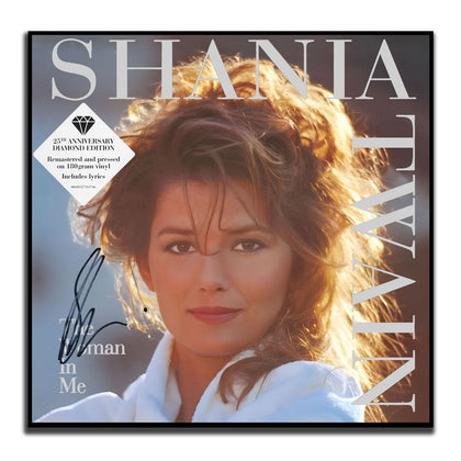 Autographed THE WOMAN IN ME vinyl LP by Shania Twain, featuring JSA COA and 25th anniversary diamond edition sticker.