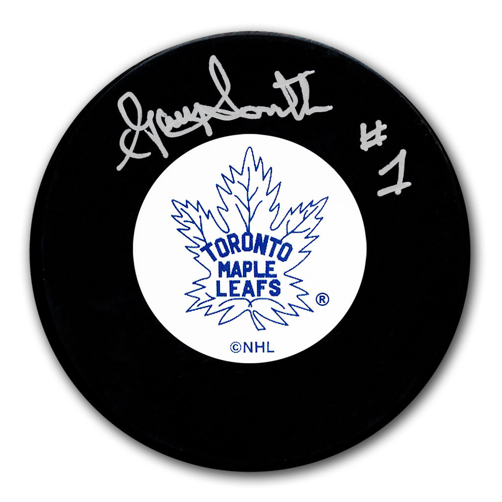 Gary Smith autographed Toronto Maple Leafs hockey puck with vintage team logo and silver signature
