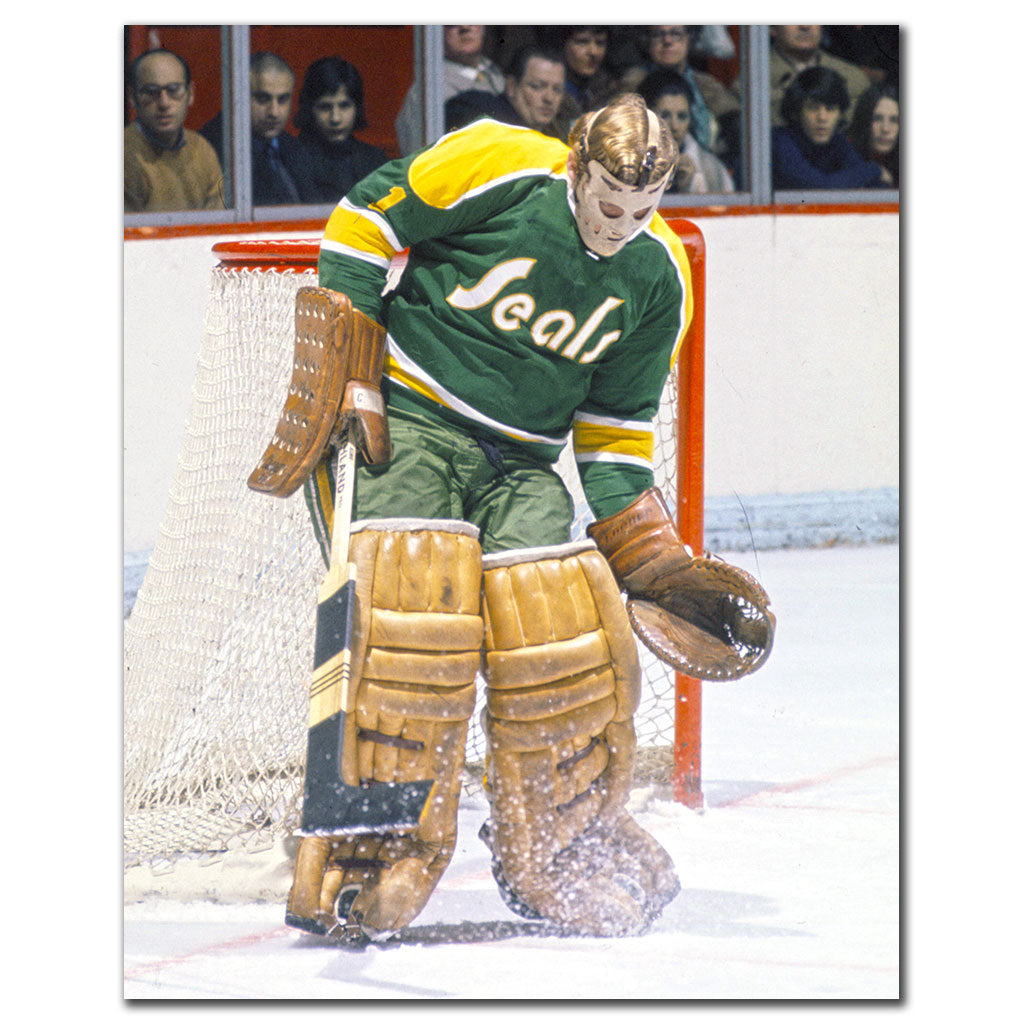 Autographed 8x10 photo of Gary Smith blocking a puck in California Golden Seals gear, featuring his signature across the image.