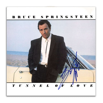 Autographed Tunnel of Love vinyl LP by Bruce Springsteen with ACOA authentication, featuring cover art of him in a suit by a car.