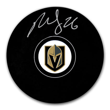 Paul Stastny Vegas Golden Knights signed hockey puck featuring the team logo and silver autograph on an official black NHL puck.