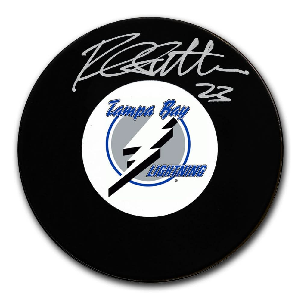 Rich Sutter autographed Tampa Bay Lightning puck, his signature and #23 marked above the official team logo on the collectible hockey puck.