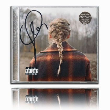 Taylor Swift Signed EVERMORE CD Album—autographed cover displays her braid, plaid coat, and prominent signature on the jewel case.