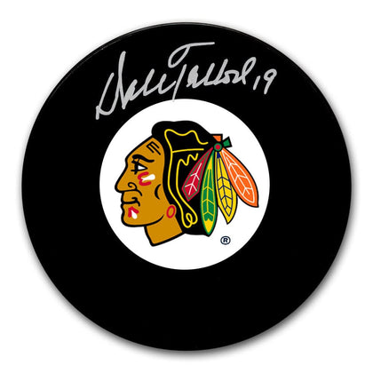 Dale Tallon Chicago Blackhawks signed hockey puck, displaying the team logo and his autograph across the upper surface.